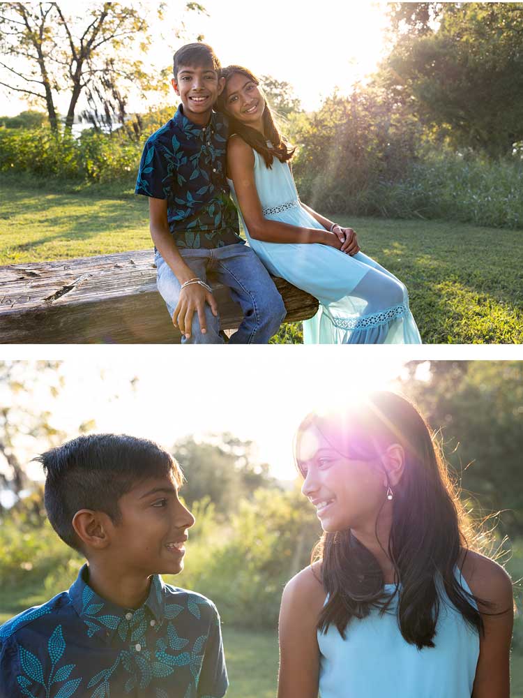 Family photos at sunset, Winfrey Point, White Rock Lake - A joyful family of four hugging tightly with a golden fall sunset glowing in the background.